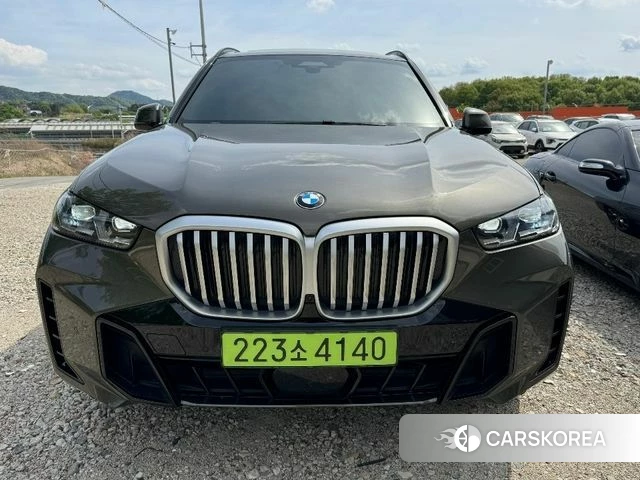 BMW X5 (G05) 2024 Золотой из Кореи
