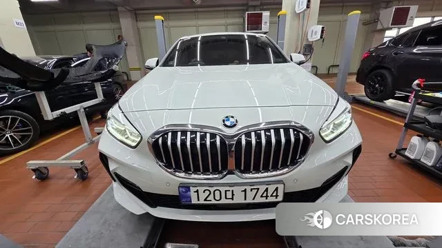 BMW 1 Series (F40) 2023 Белый из Кореи