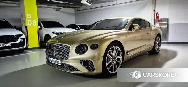 Bentley Continental GT 3rd Generation 2023 Золотой из Кореи