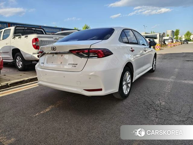 Toyota Corolla 2023 Белый из Китая