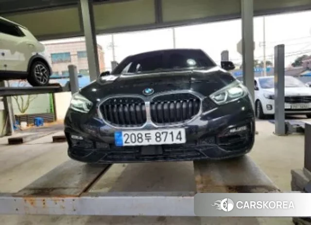 BMW 1 Series (F40) 2024 Черный из Кореи