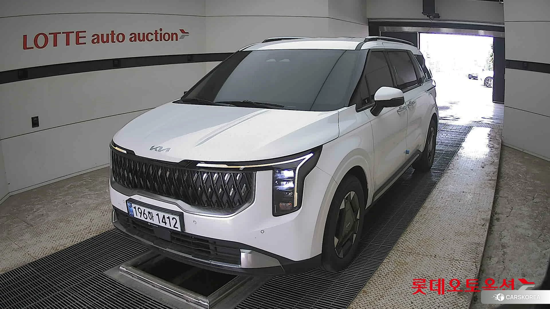 Kia Carnival Hybrid 2024 Белый из Кореи