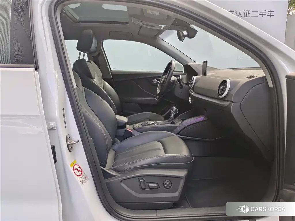 Audi Q2L 2023 Белый из Китая