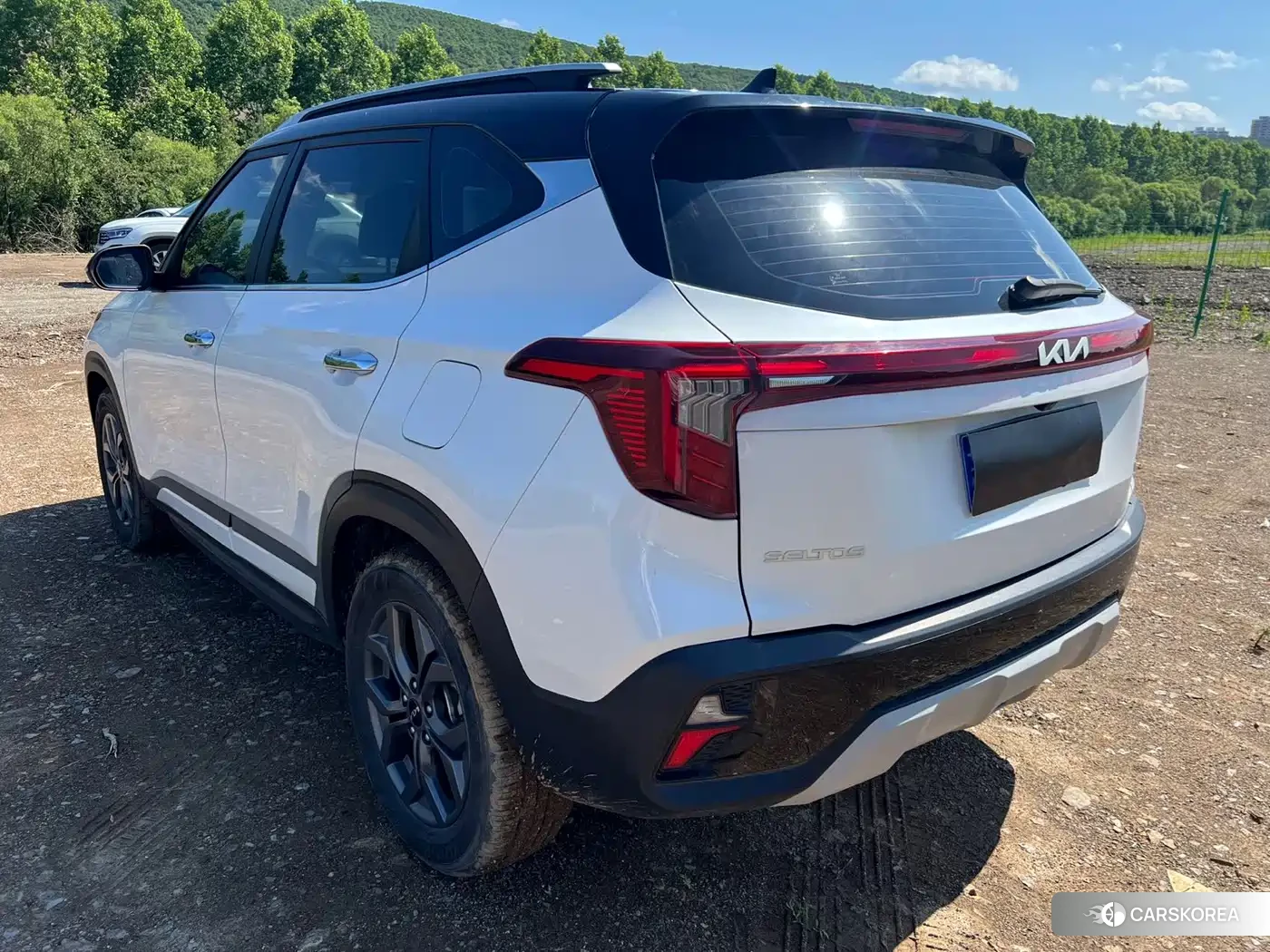 Kia Seltos 2023 Белый из Китая