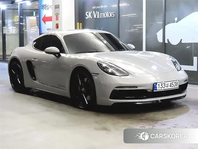 Porsche 718 Cayman 2023 Белый из Кореи