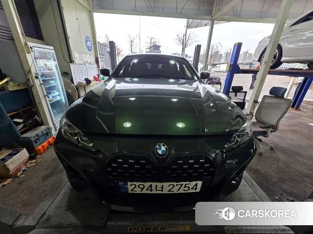 BMW 4 Series (G22) 2024 Темно-зеленый из Кореи