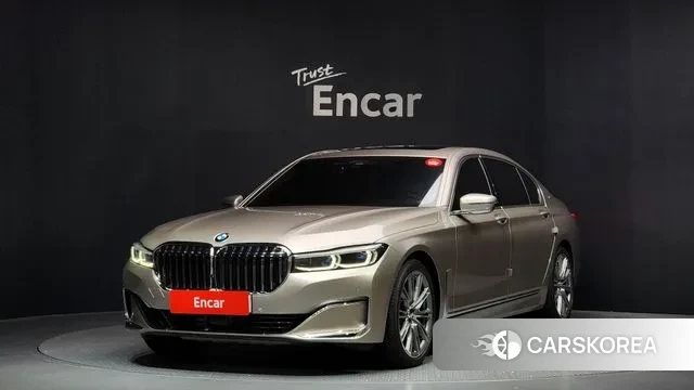BMW 7 Series (G11) 2021 Песочный из Кореи