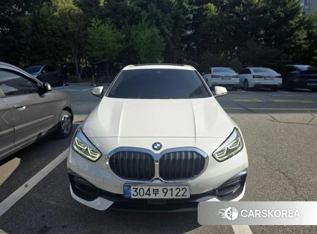 BMW 1 Series (F40) 2021 Белый из Кореи