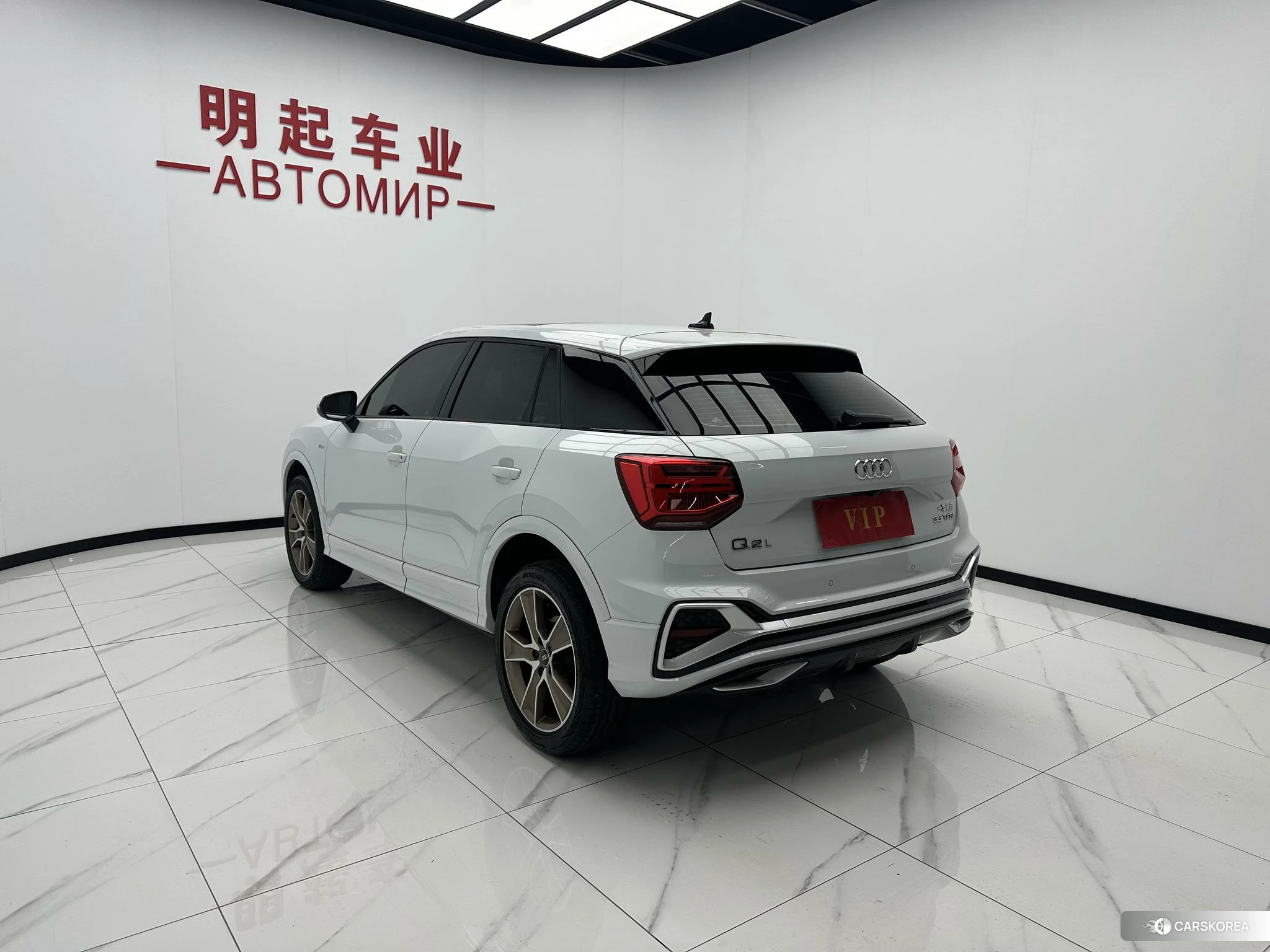 Audi Q2L 2021 Белый из Китая