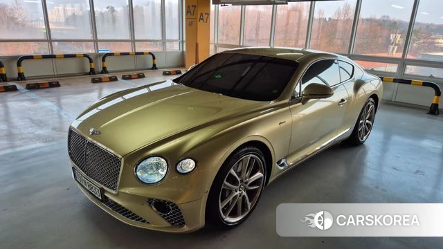 Bentley Continental GT 3rd Generation 2023 Золотой из Кореи