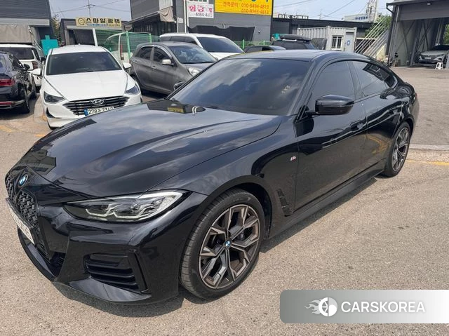 BMW 4 Series (G22) 2024 Черный из Кореи
