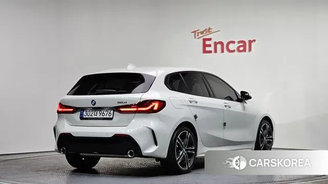 BMW 1 Series (F40) 2023 Белый из Кореи