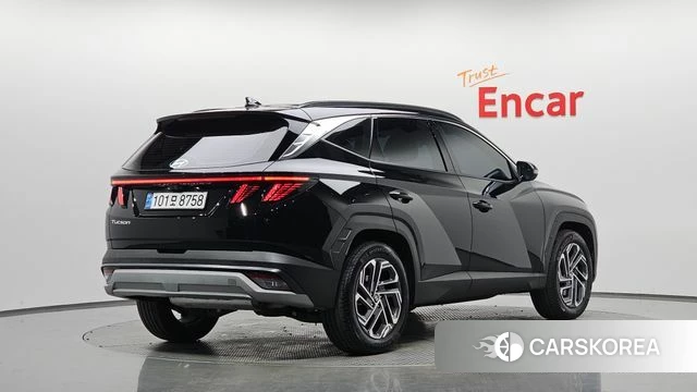 Hyundai The New Tucson Hybrid (NX4) 2024 Черный из Кореи