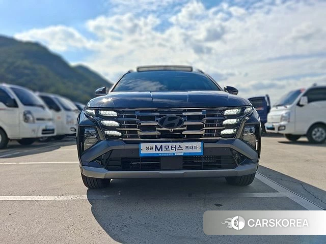 Hyundai The New Tucson Hybrid (NX4) 2024 Черный из Кореи