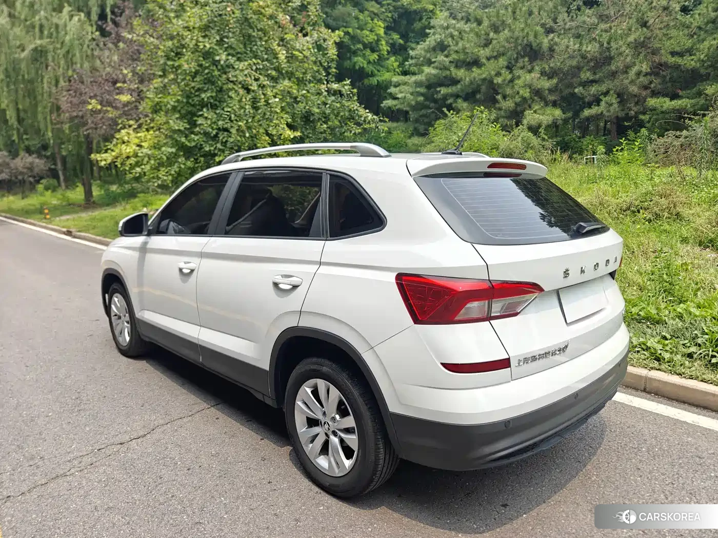 Skoda Komick 2024 Белый из Китая
