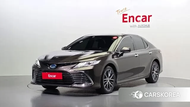 Toyota Camry (XV70) 2023 Песочный из Кореи