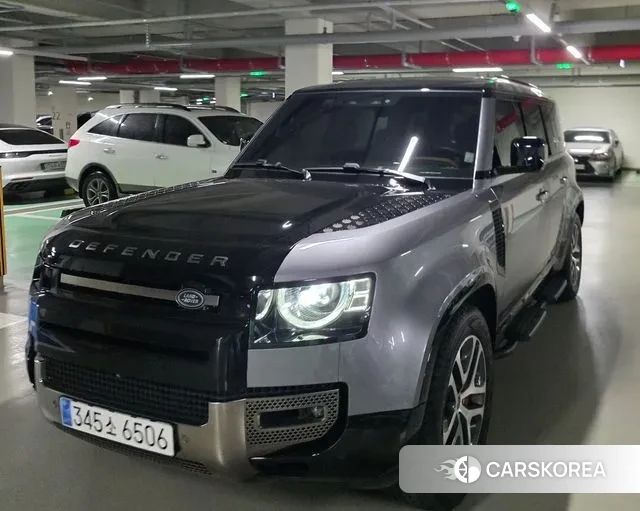 Land Rover Defender (L663) 2023 Серебряный двухцветный из Кореи