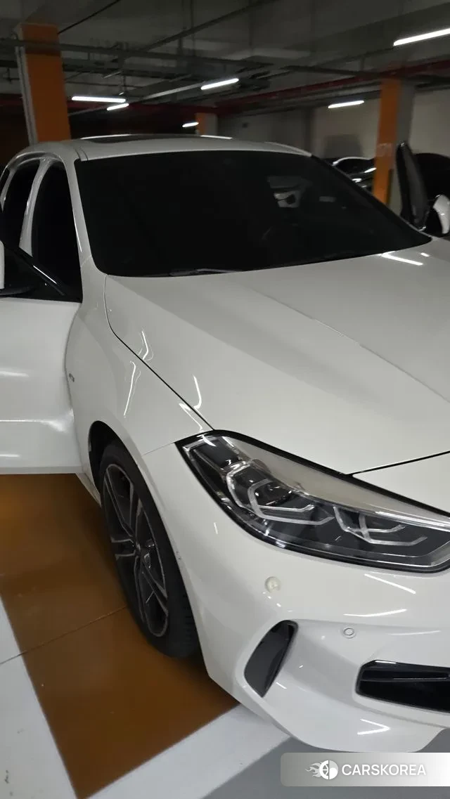 BMW 1 Series (F40) 2023 Белый из Кореи