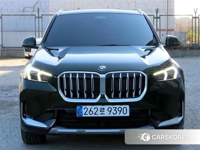 BMW X1 (U11) 2024 Темно-зеленый из Кореи