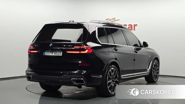 BMW X7 (G07) 2024 Черный из Кореи