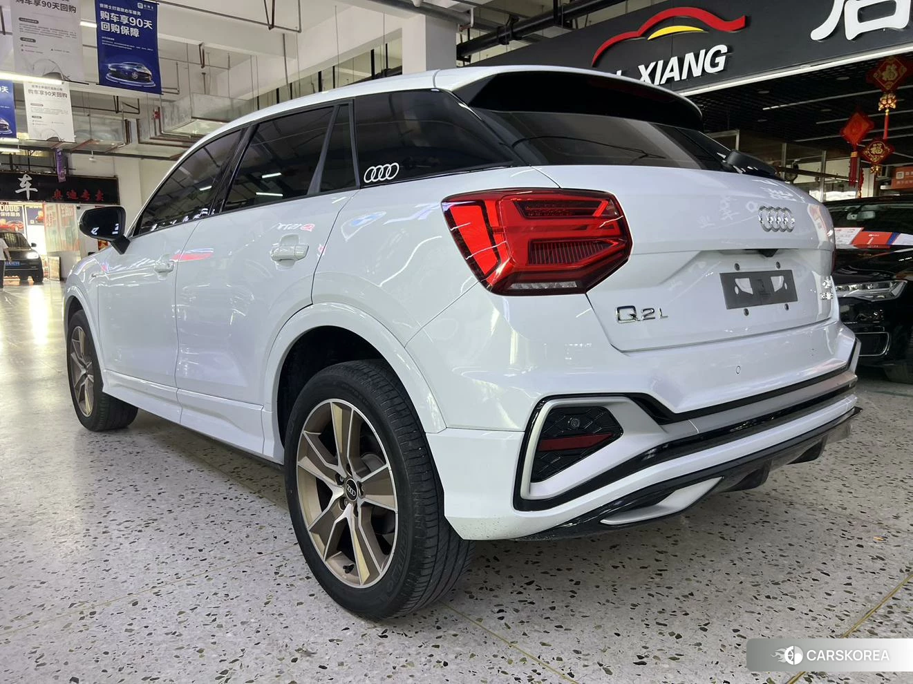 Audi Q2L 2021 Белый из Китая