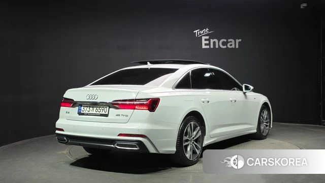 Audi A6 (C8) 2023 Белый из Кореи