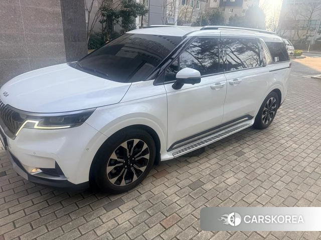Kia Carnival 4th generation 2023 Белый из Кореи