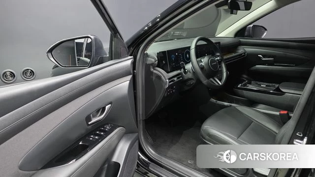 Hyundai The New Tucson Hybrid (NX4) 2024 Черный из Кореи, фото 2