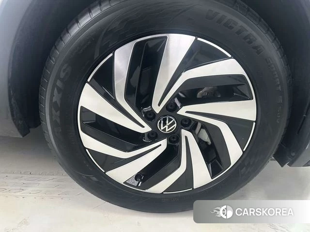 Volkswagen Tiguan L 2023 Белый из Китая, фото 2
