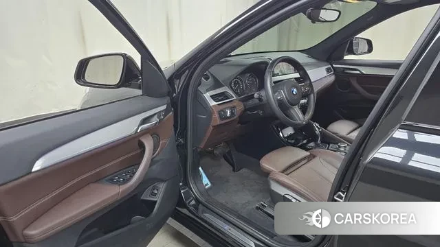 BMW X1 (F48) 2022 Черный из Кореи, фото 2