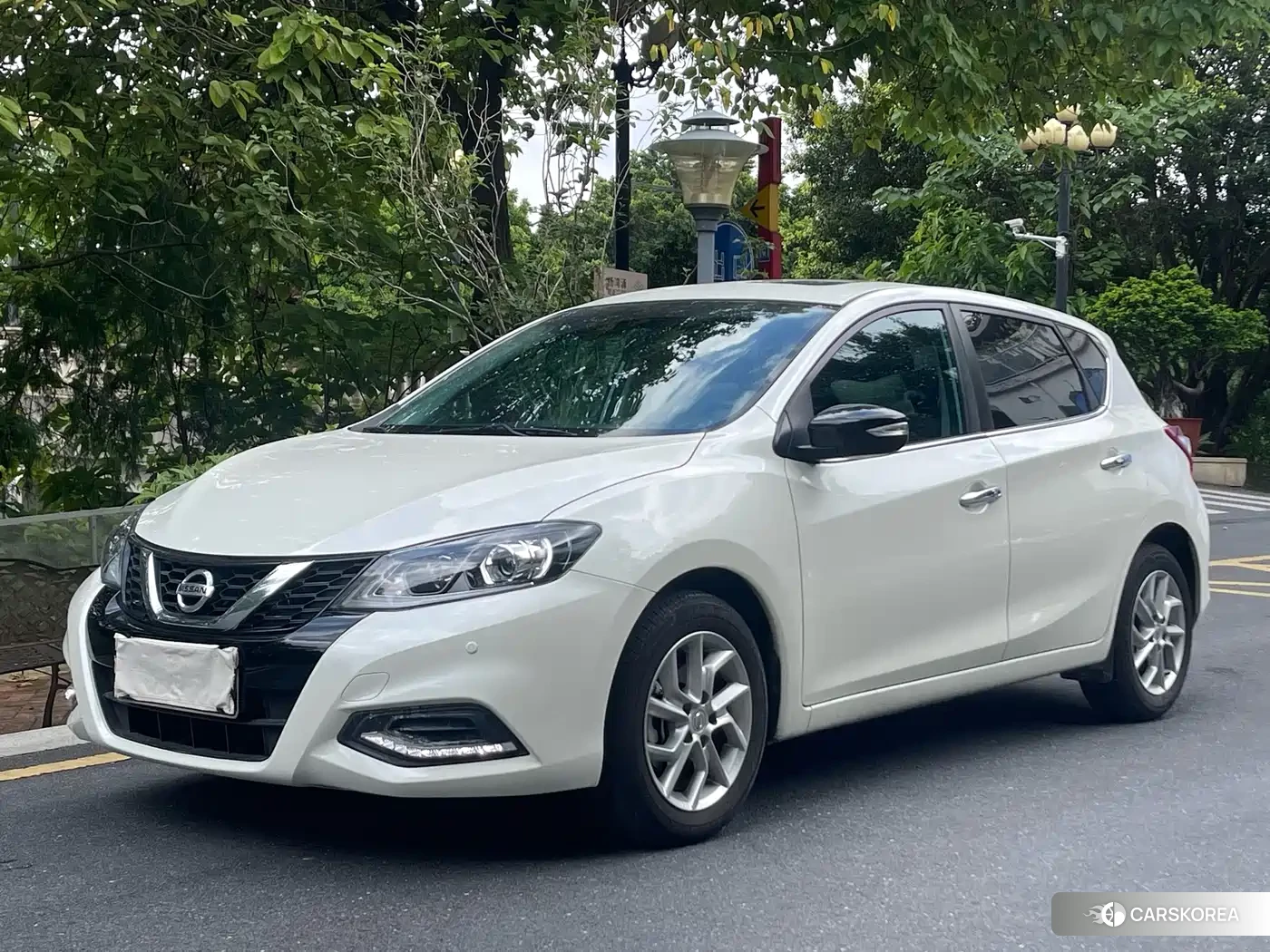 Nissan Tiida 2024 Белый из Китая, фото 2