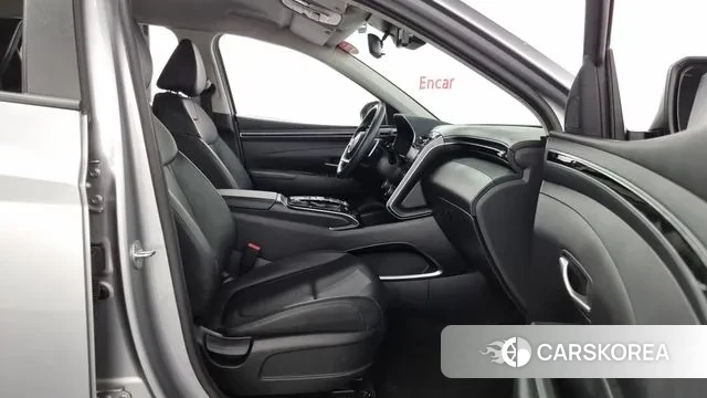 Hyundai Tucson (NX4) 2023 Серебристо-серый из Кореи, фото 2