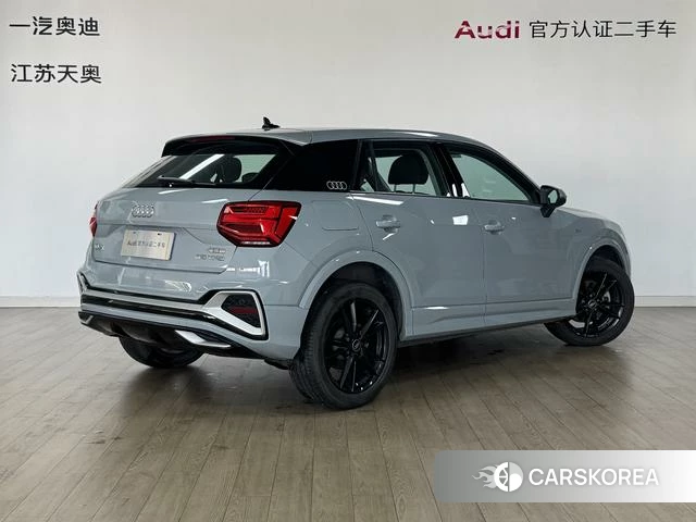 Audi Q2L 2024 Темно-серый из Китая, фото 2