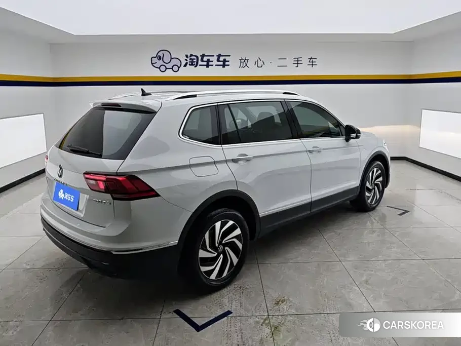 Volkswagen Tiguan L 2024 Белый из Китая, фото 2