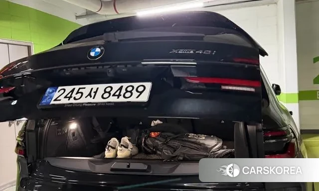 BMW X7 (G07) 2024 Черный из Кореи, фото 2