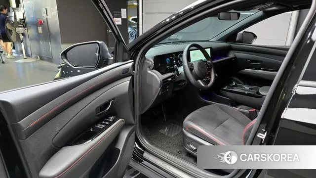 Hyundai The New Tucson Hybrid (NX4) 2024 Черный из Кореи, фото 2