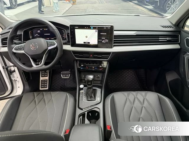 Volkswagen Tiguan L 2024 Белый из Китая, фото 2