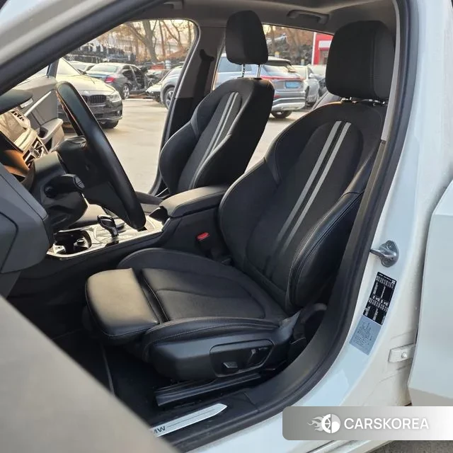 BMW 1 Series (F40) 2023 Белый из Кореи, фото 2