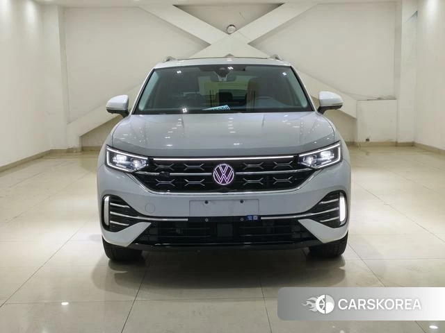 Volkswagen Tanyue 2023 Белый из Китая, фото 2