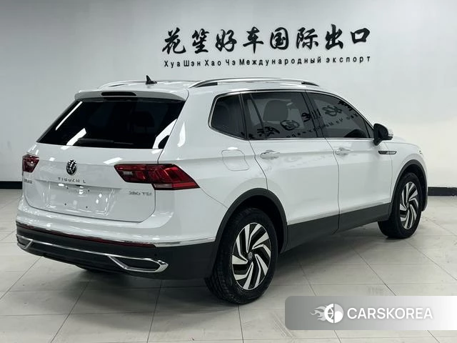 Volkswagen Tiguan L 2023 Белый из Китая, фото 2