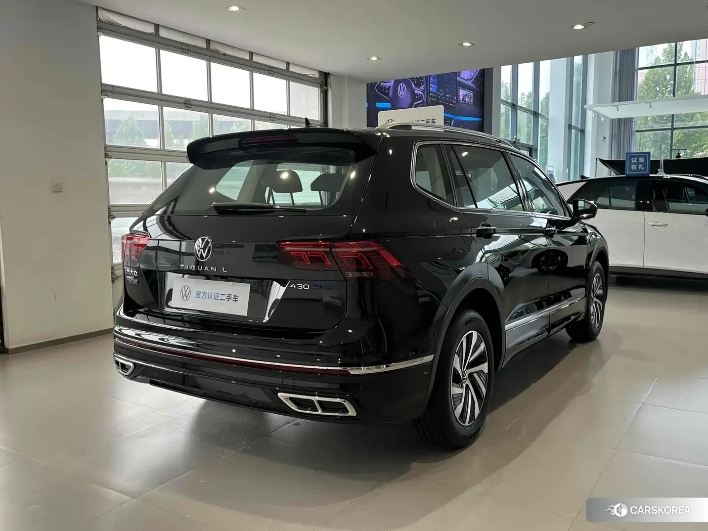 Volkswagen Tiguan L plug-in hybrid 2025 Черный из Китая, фото 2
