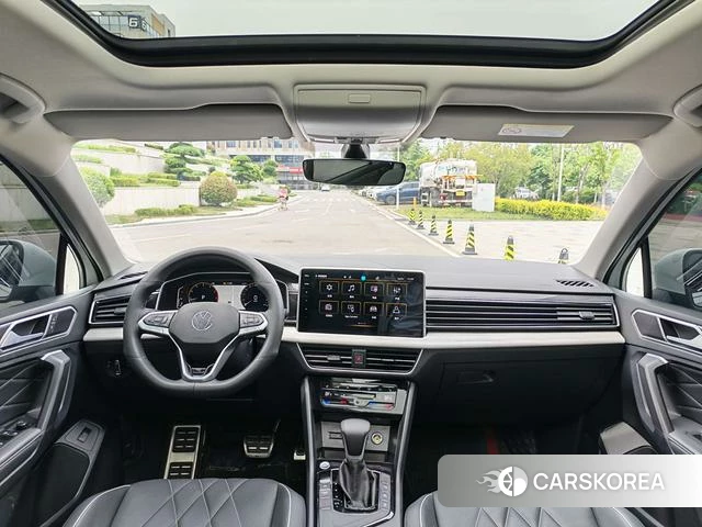 Volkswagen Tiguan L 2024 Белый из Китая, фото 2