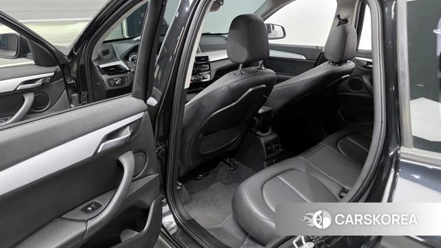 BMW X1 (F48) 2018 Черный из Кореи, фото 2