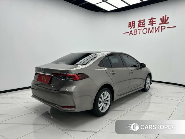 Toyota Corolla 2024 Серебристо-серый из Китая, фото 2