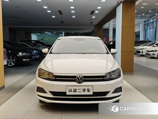 Volkswagen Polo 2023 Белый из Китая, фото 2