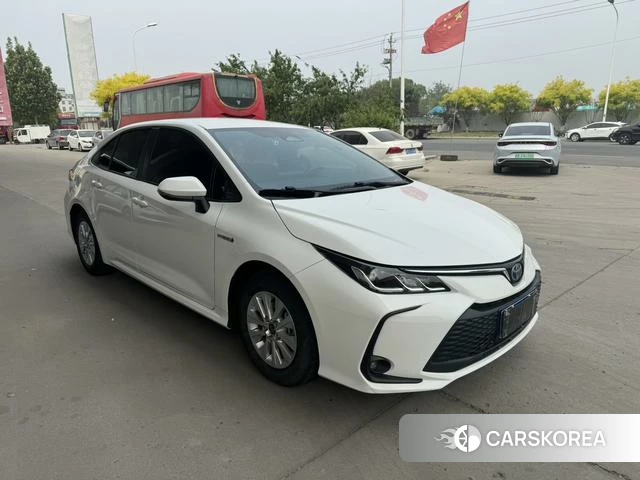 Toyota Corolla 2024 Белый из Китая, фото 2