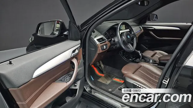 BMW X1 (F48) 2021 Черный из Кореи, фото 2