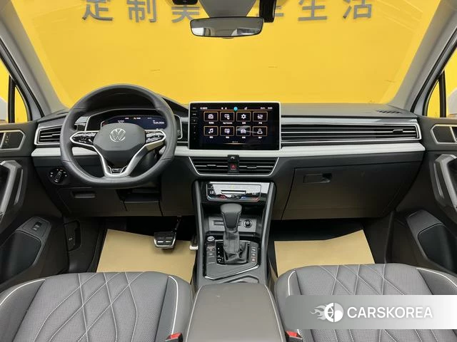 Volkswagen Tiguan L 2023 Белый из Китая, фото 2