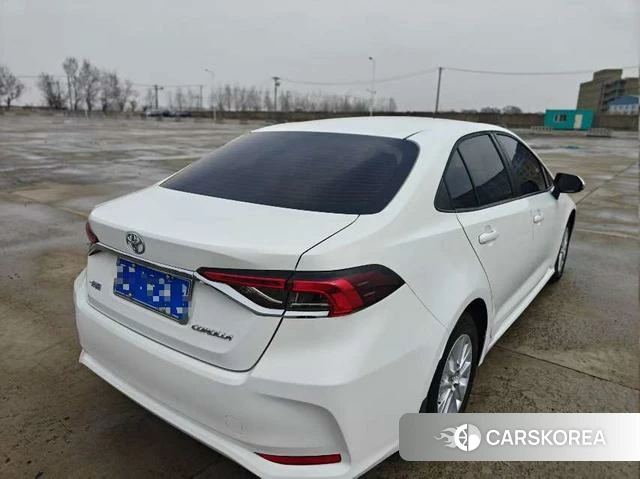 Toyota Corolla 2022 Белый из Китая, фото 2