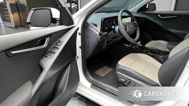 Kia Di Ol Nu Niro 2024 Белый из Кореи, фото 2